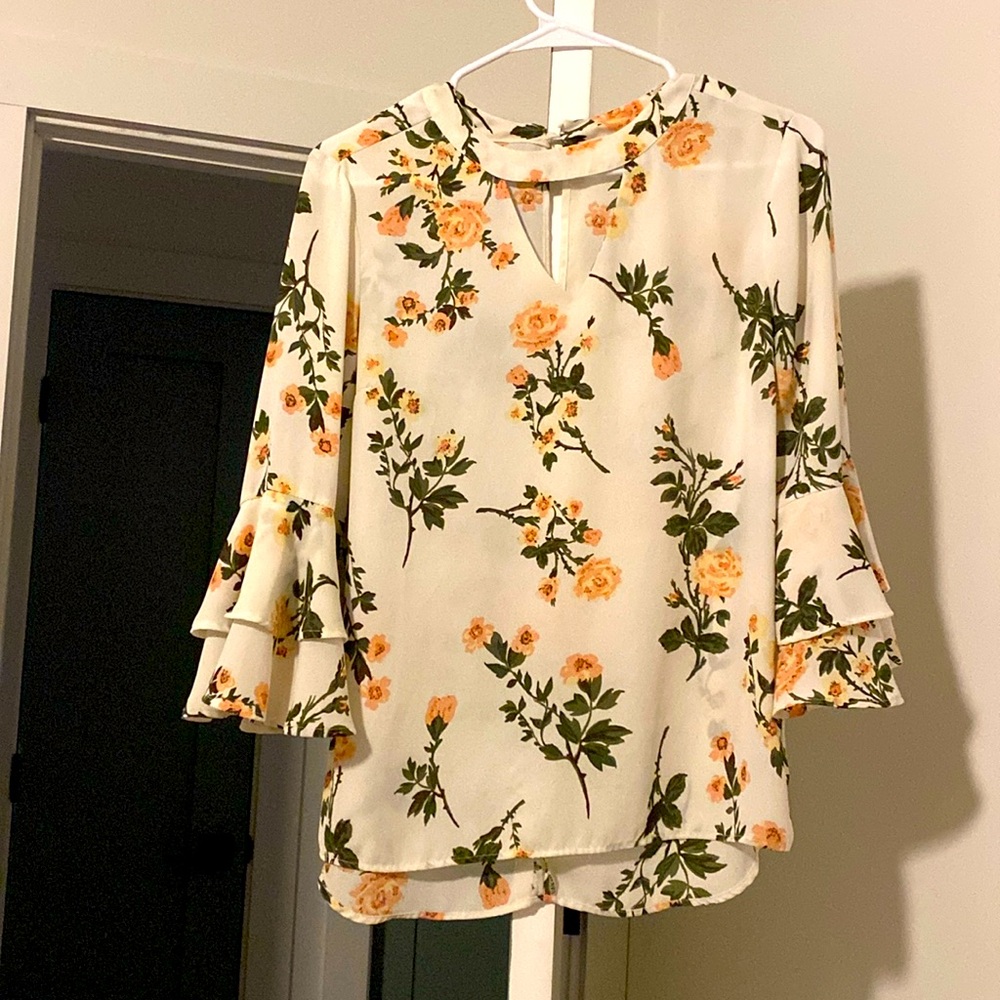 Charming Charlie women’s blouse with flower details